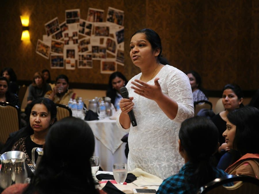 A speaker addressing an audience at a workshop