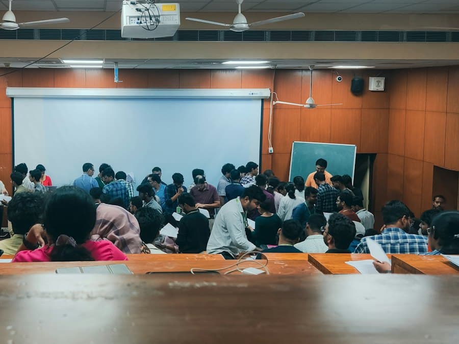 Students attending a seminar in a college hall