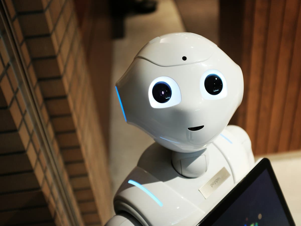 A friendly white humanoid robot